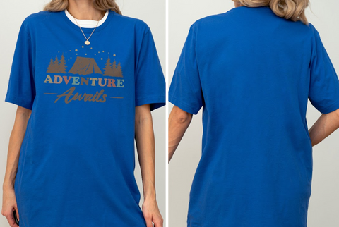 A woman wearing a blue t-shirt with the text "Adventure Awaits" printed on it.