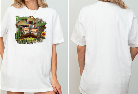 A white t-shirt with a graphic design featuring a skull wearing a sombrero and sunglasses, surrounded by various Mexican-themed elements such as cacti, flowers, and a sunflower.